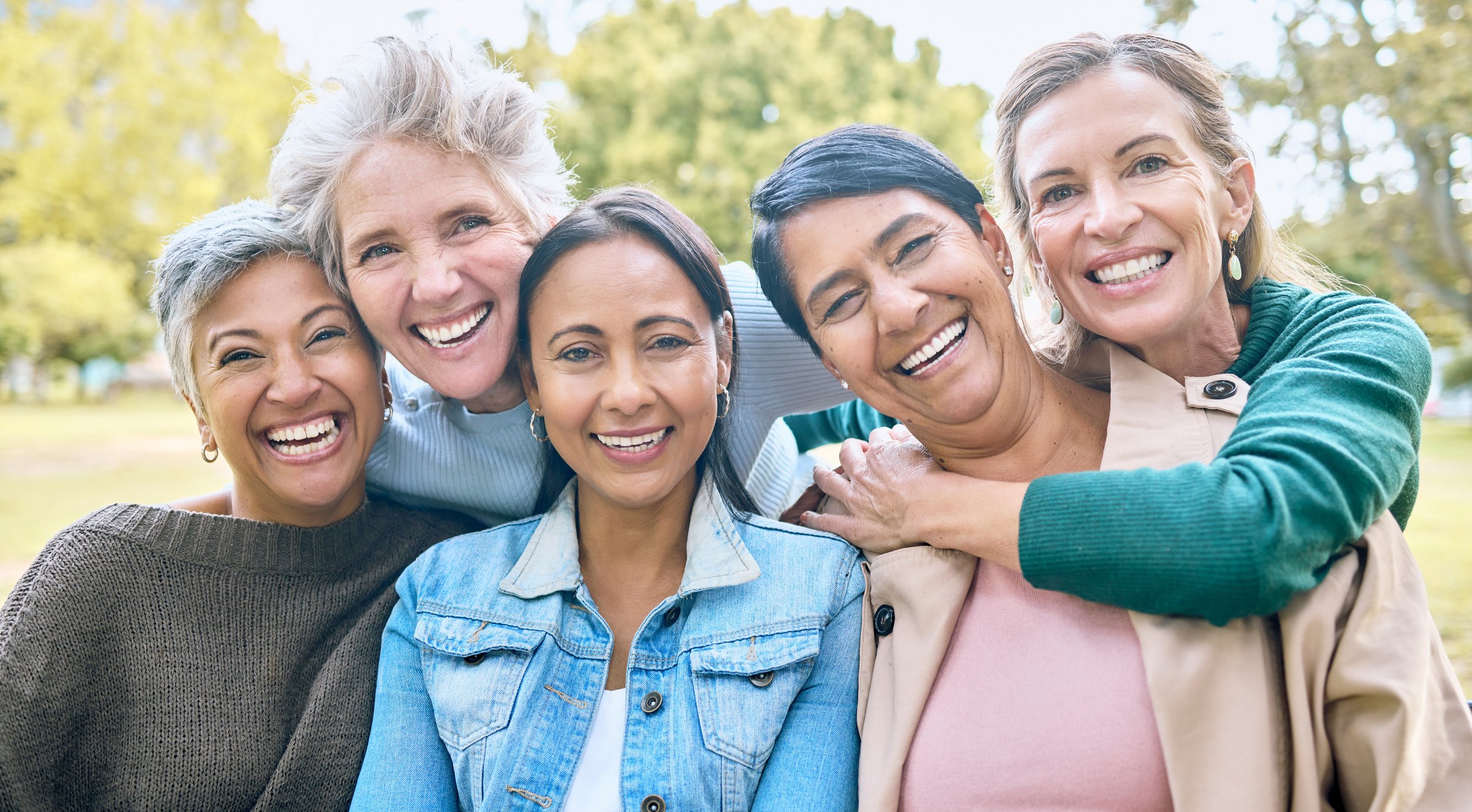 nature-friends-portrait-group-women-enjoying-bonding-quality-time-relax-retirement-together-diversity-friendship-faces-happy-females-with-smile-hugging-wellness